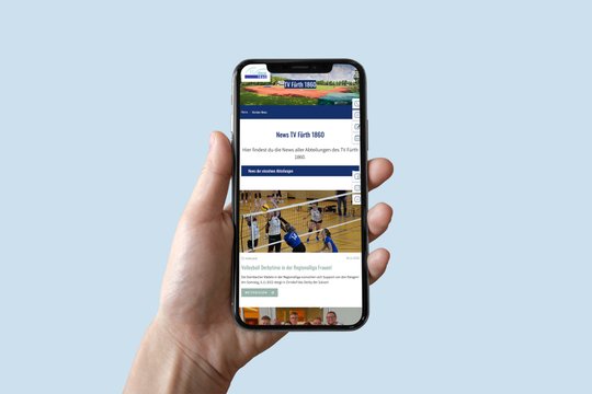Smartphone zeigt Webseite des TV Fürth 1860