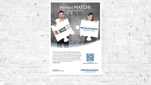 Poster der Integrationskampagne hängt an der Wand