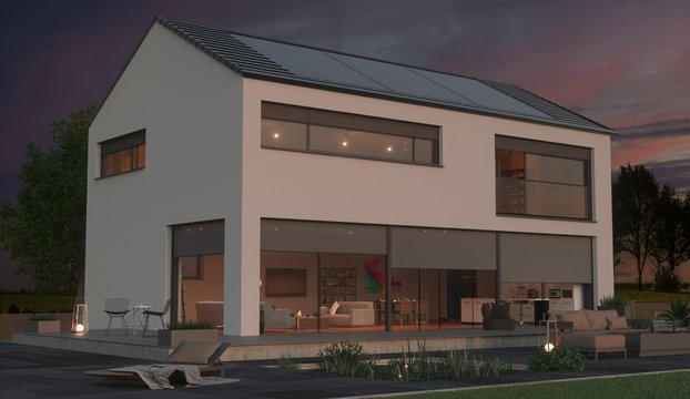 Modernes Satteldachhaus in einer Abendstimmung