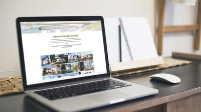 Webseite von CH Wohnen ist auf einem Laptop geöffnet