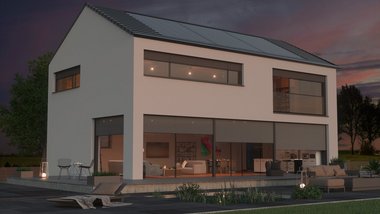 Modernes Satteldachhaus in einer Abendstimmung