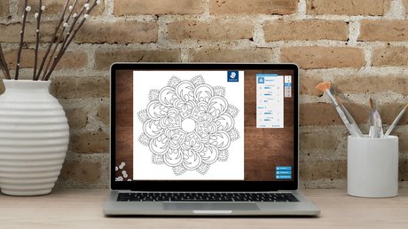 Mandala Creator von Staedtler ist auf einem Laptop zu sehen. 